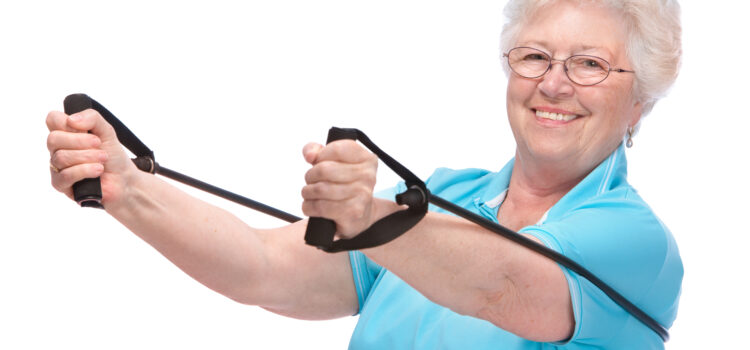 Senior Woman Exercising with Resistance Band